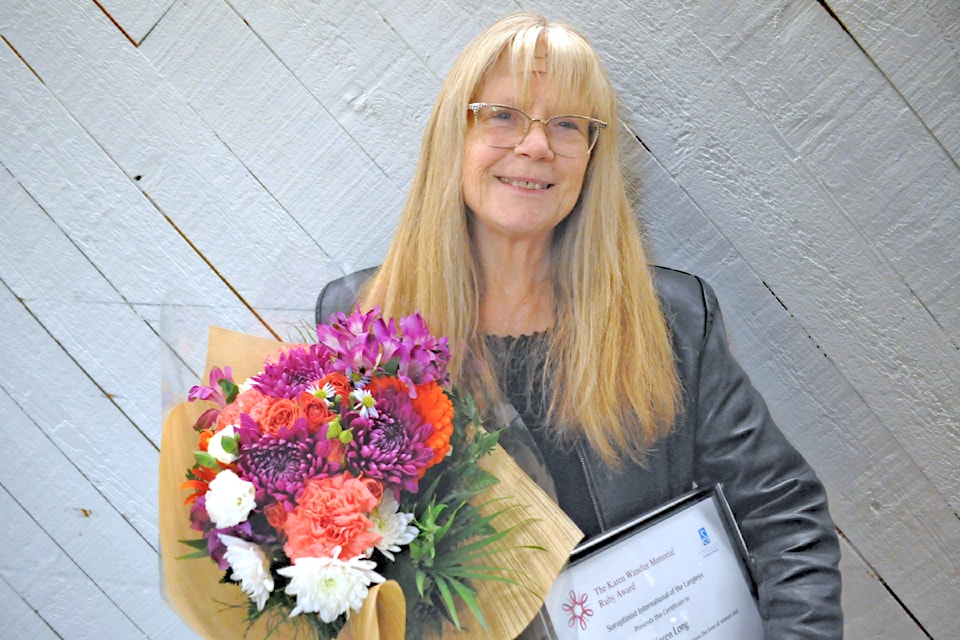 Karen Long received the Karen Wandler Memorial Award, also known as the Ruby, from the Soroptimists of the 91ԭs. 