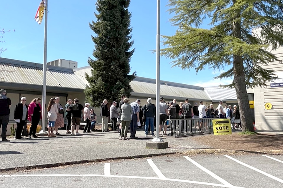 There were long lines at some polling places, like Douglas Park Community School in Cloverdale-91ԭ City, on Friday, April 18, the first day of advance polls.