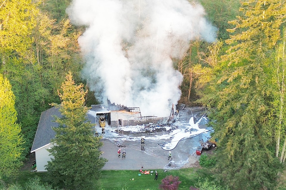 A building that appeared to be a garage on a property south of Aldergrove was destroyed by fire on Wednesday, April 23.