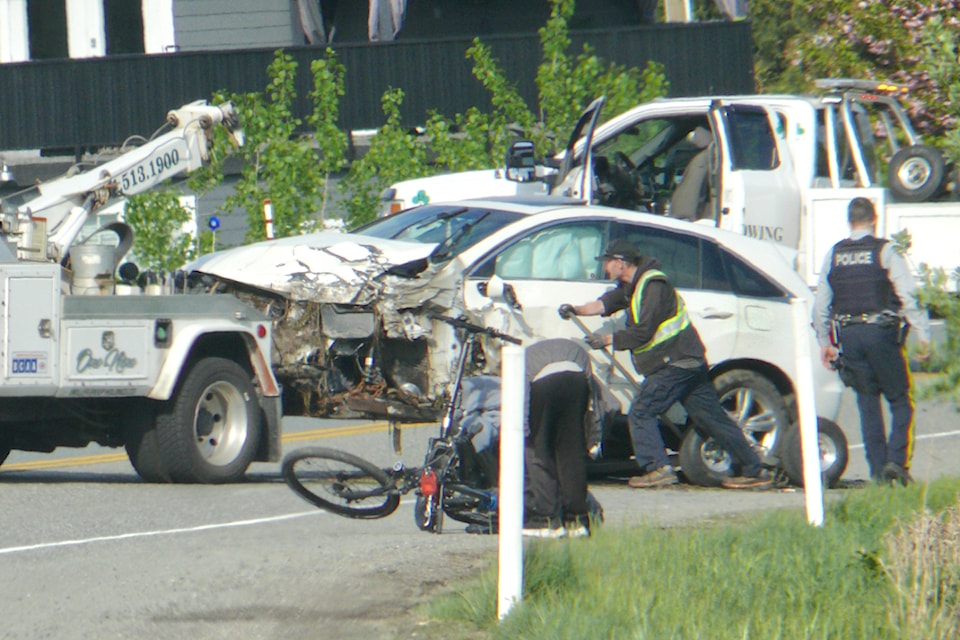A damaged car was towed away in the aftermath of a multi-vehicle crash on April 30, 2025 on Highway 10 in Langley