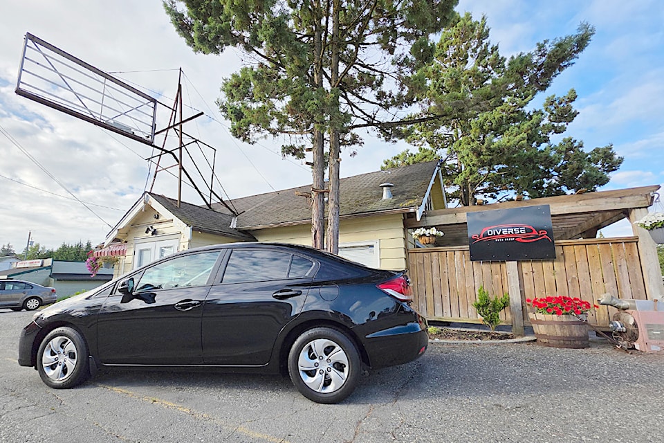 91ԭ's Diverse Auto Group is the new occupant of the old Hilltop Cafe. While the exterior has been preserved, the  iconic sign had to come down to avoid confusion, the new occupants said.