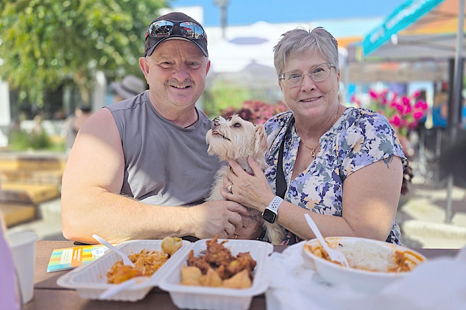 Lexi brought her humans, Peter and Catherine Siermacheski, from Walnut Grove to the biggest Fork and Finger yet, with 30 91ԭ City restaurants participating.
