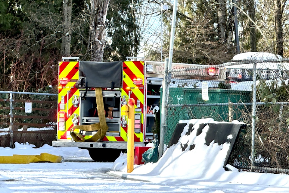 91ԭ Township fire crews and RCMP members are on scene for a fire at Creekstone, next to Home Depot, on Friday, Feb. 7. (Heather Colpitts/91ԭ Advance Times)