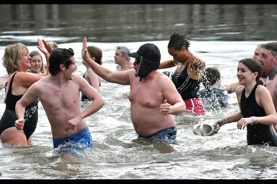 Hundreds of swimmers braved frigid waters to start the new year in Fort Langley on Wednesday  Jan. 1.