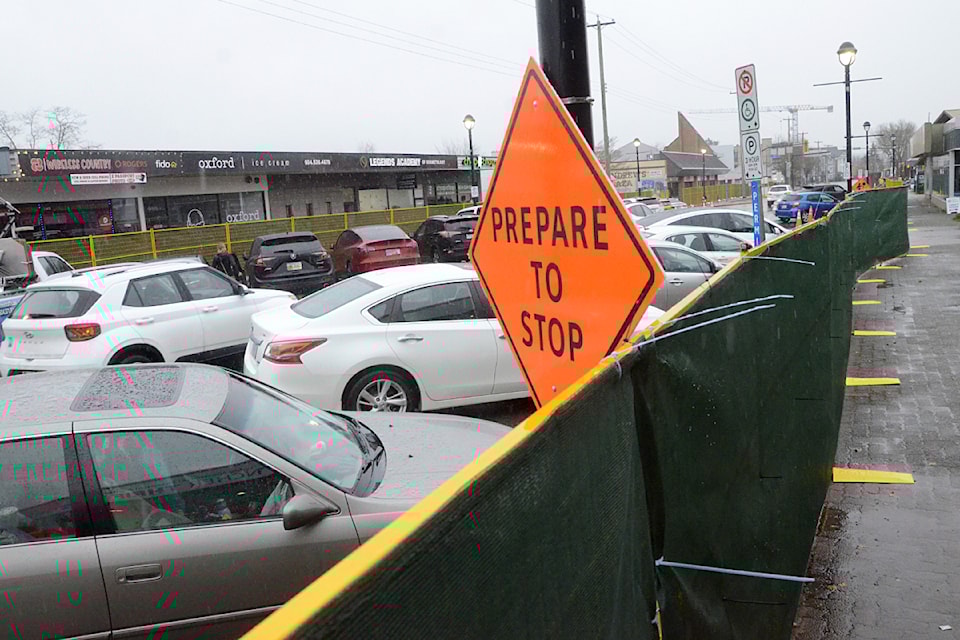 Fences have gone up along the one-way section of Fraser Highway as reconstruction is set to begin soon.