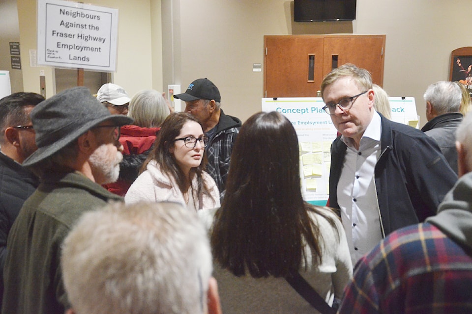 Mayor Eric Woodward (right) spoke to a group of locals about the Fraser Employment Lands project.