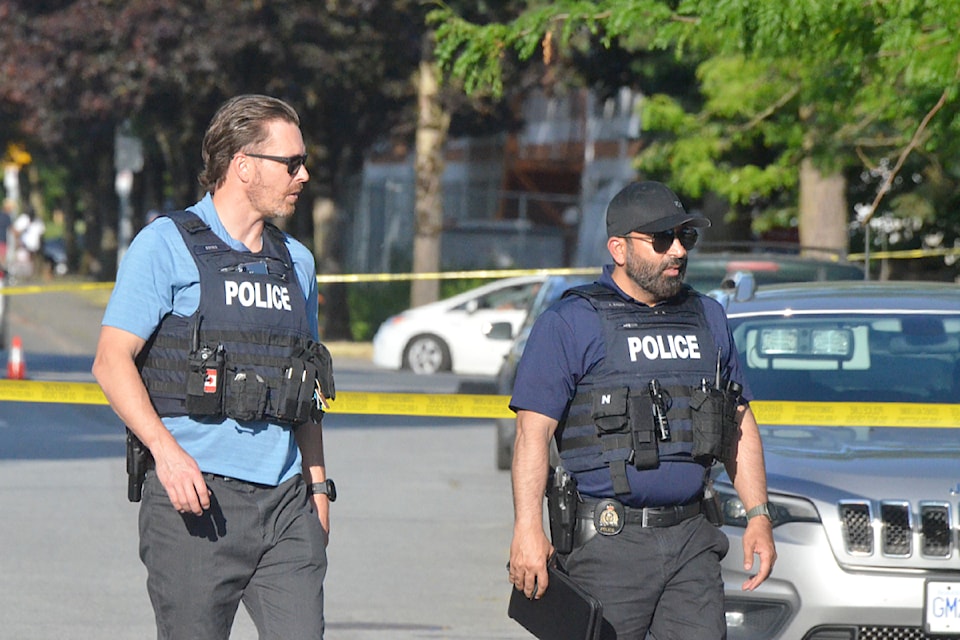Officers on the scene of the shooting on Willoughby Way on Monday, July 7.