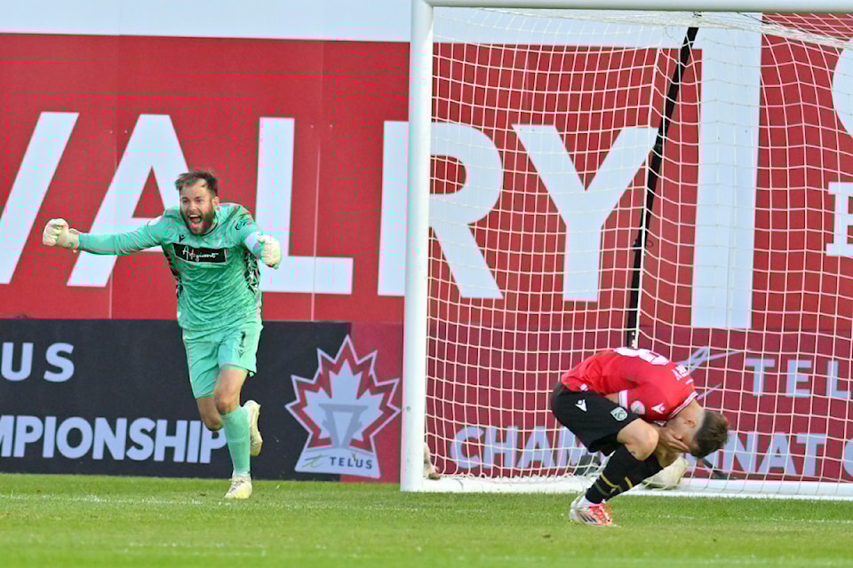 Eagles goalkeeper Callum Irving celebrated after making the winning save of the game on a penalty kick by midfielder Mael Henry of Cavalry FC.