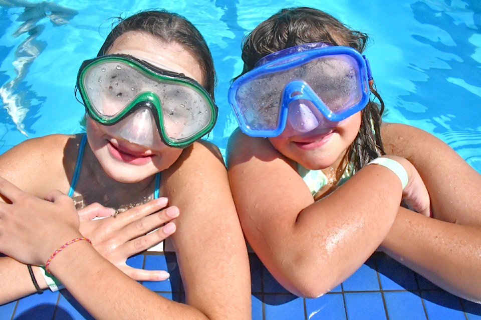 Avia and Amelia were ready for the Legendary Waterfight, bringing googles to the Al Anderson Memorial Pool on July 12, 2025. (Heather Colpitts/)