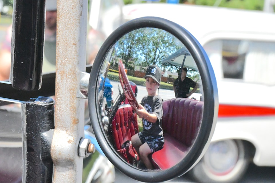 The Shriners allowed people to sit in their 1925 Chev truck. Ryder Ridale hopped right into the driver's seat at the Old Farts Car Club annual show July 13, 2025.