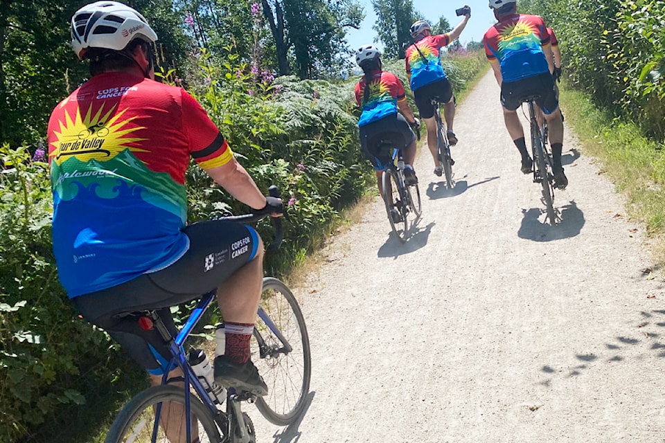 Riders headed along a gravel trail on the last part of a July 16 training day for Cops for Cancer Tour de Valley.