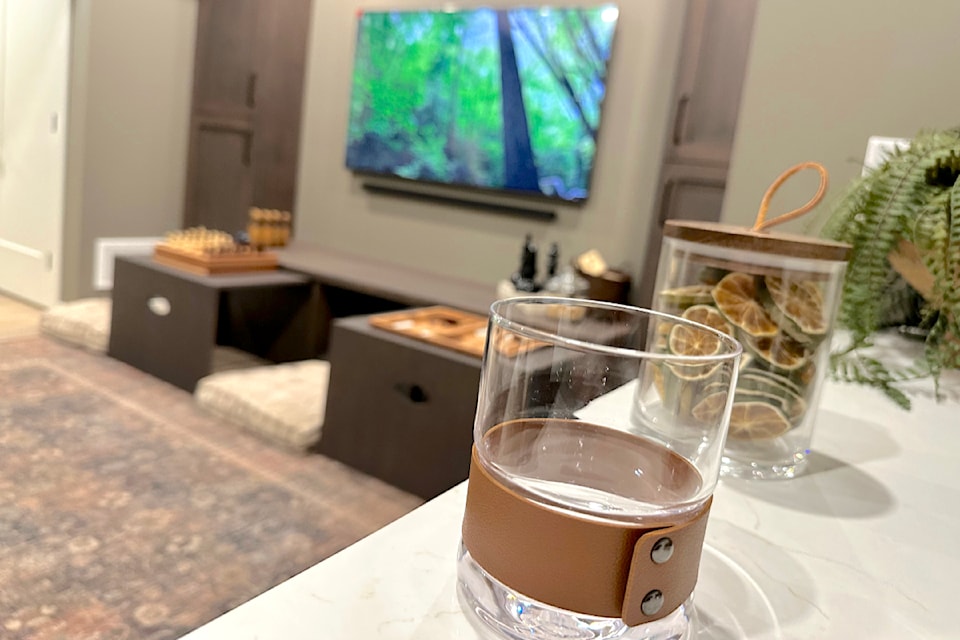 The home comes with several TVs which also look like framed art when not in use. 