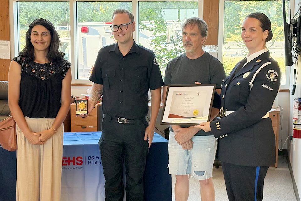 Azadeh Bell-Irving, paramedic Case Ambrose, patient Murray Williamson, and paramedic Sarah Patch at the Vital Link Award ceremony on July 15 in Surrey.