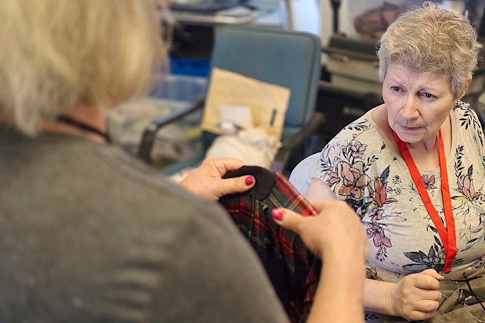 91ԭ City resident Sally Mills and her sewing machine were making fixes at the 91ԭ Environmental Partners Society fourth repair cafe of the year.