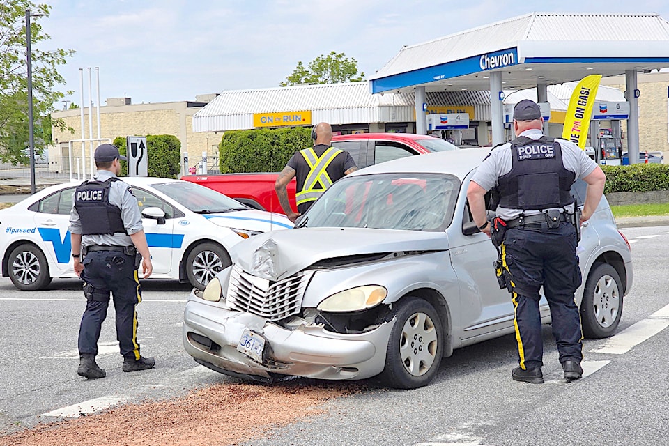 Police, firefighters, and ambulance paramedics were on scene after a crash Monday, June 16 on Willowbrook Drive near 200 Street.