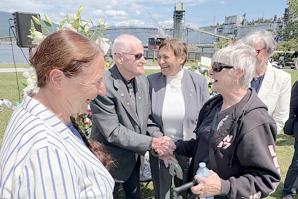 's Lucien Lessard, 96, is the last survivor of the collapse of the Second Narrows bridge. He fell from the bridge deck into the Burrard Inlet on June 17, 1958. Lessard chatted with B.C. MLAs Susie Chant (L) and Joan Phillip (R) at a memorial event marking the anniversary. 
