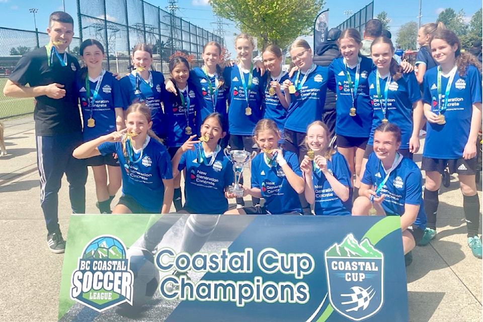They have reason to smile. The picture was taken after Aldergrove U14 won the Coastal Cup with another shootout win.