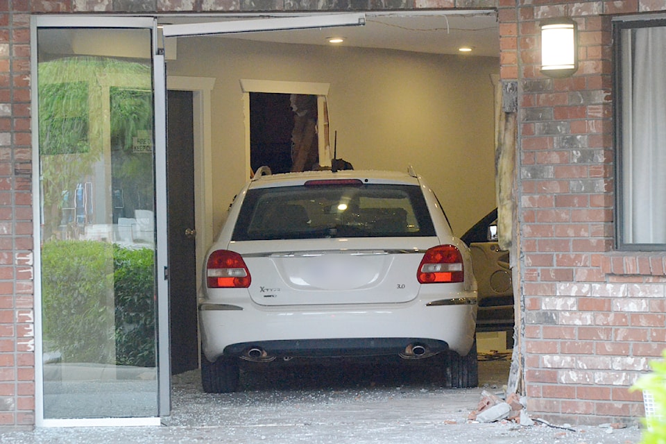 A white hatchback came to rest in the lobby of Park Terrace apartments on Tuesday, May 13, 2025.