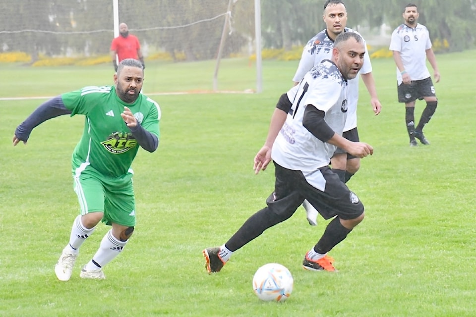 After 17 years, the revived Battle of the Giants” soccer tournament returned, getting off to a wet start on three fields at 91ԭ's McLeod Athletic Park
