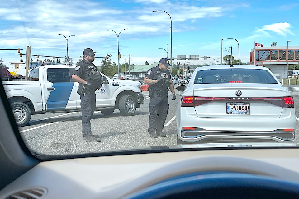 Blaine immigration lawyer Leonard Saunders took this picture of a U.S. outbound checkpoint stopping cars as they were about to cross into B.C. at the truck crossing. He said clients have told him the lineups have meant delays as long as 2 hours going into Canada.