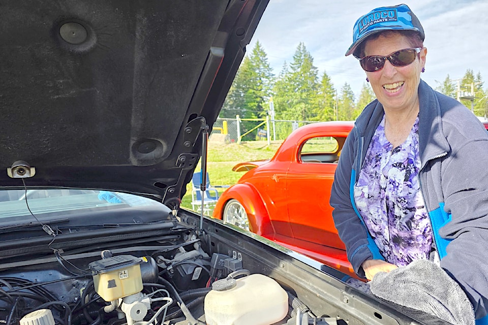 Linda Vartell was polishing up a car for a friend. More than 300 vehicles filled the playing field at Brookswood Secondary School for the annual family friendly fundraiser.