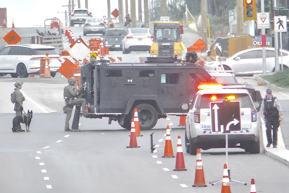 IERT officers in tactical gear, with a police dog, could be seen at the location of a 'serious' incident on 208 St. near 72 Ave.