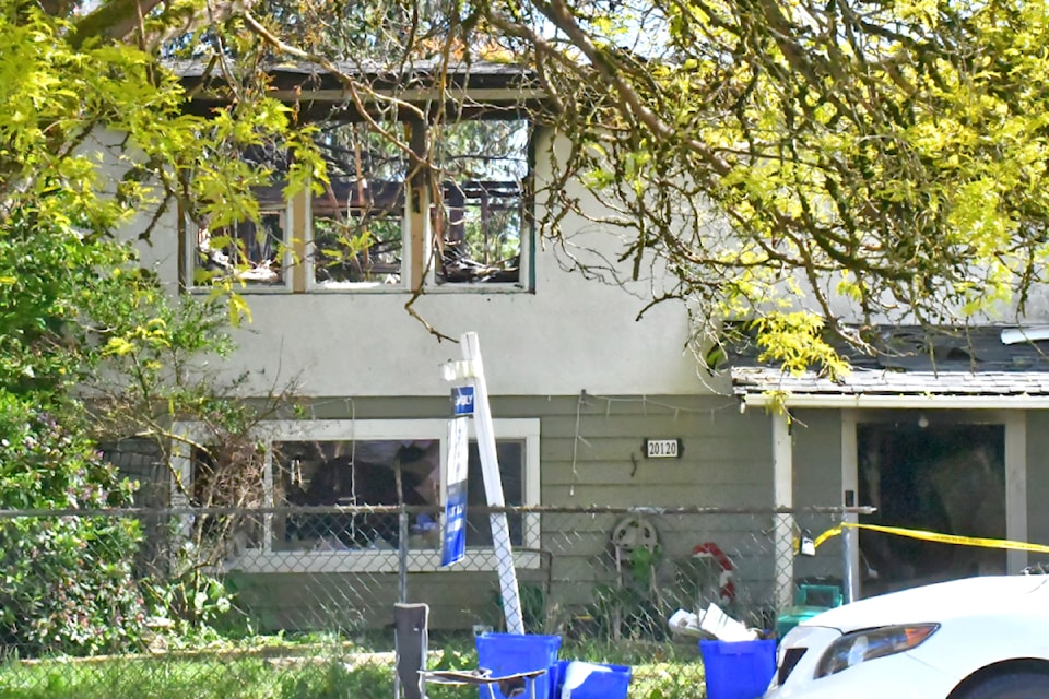 The roof has collapsed on a house in the 20100-block of 53 Avenue after a fire in the early  morning hours of Thursday, June 6, 2024. (Heather Colpitts/Langley Advance Times)
