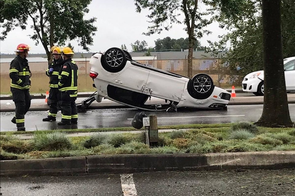 web1_170608-LAT-M-flipped-car-64