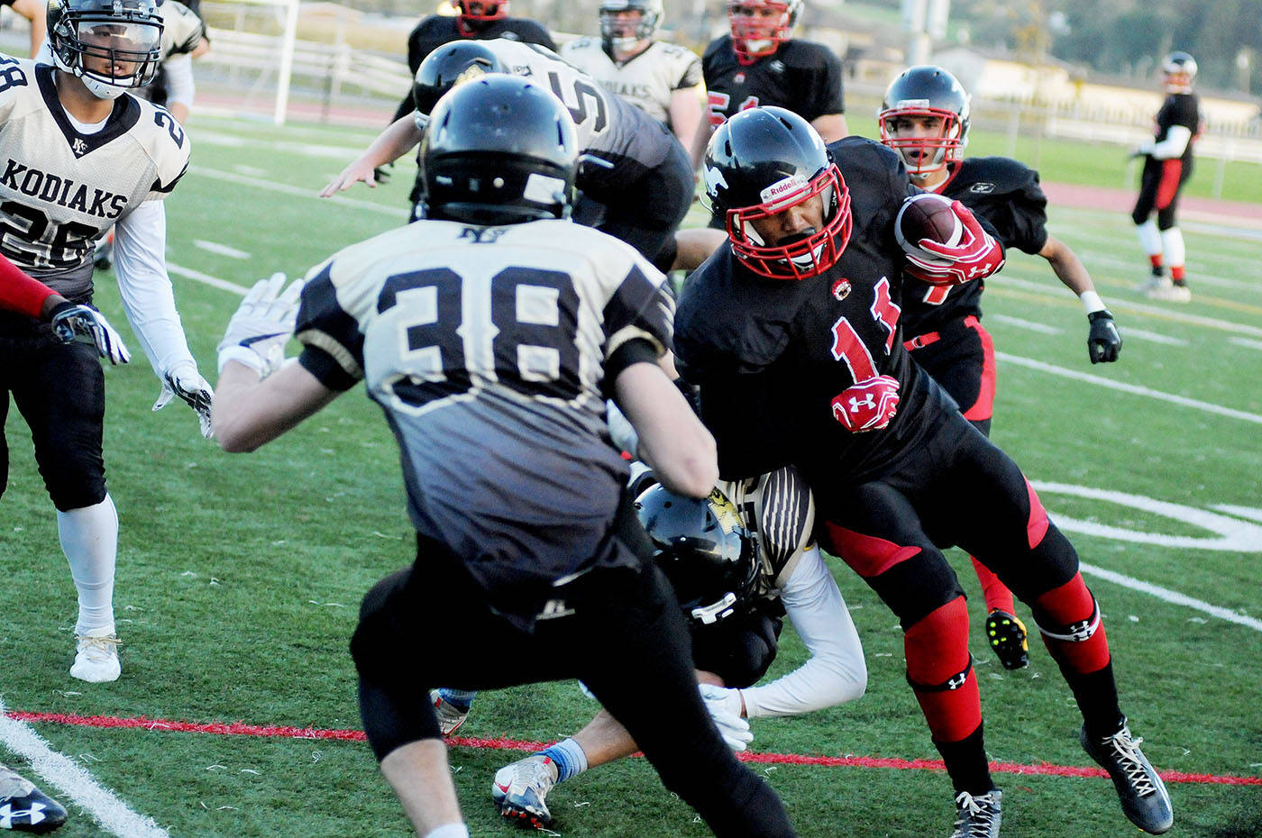 8899373_web1_171011-LAT-sports-stamps-vs-kodiaks3