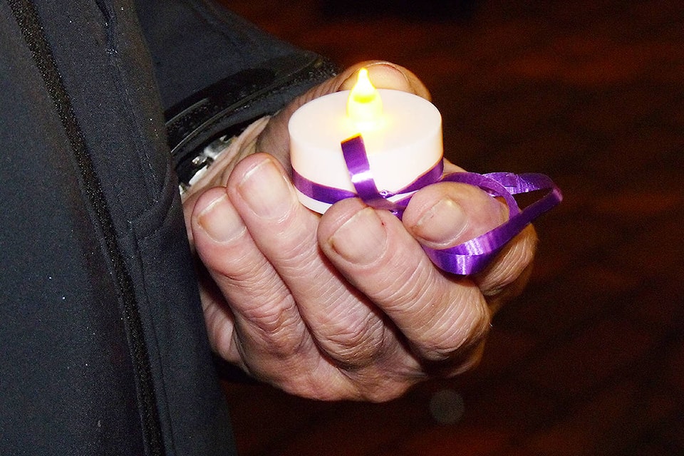 9535473_web1_copy_171126-LAT-vigil-red-candle