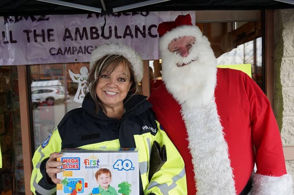 9767909_web1_Fill-ambulance-santa-and-kim