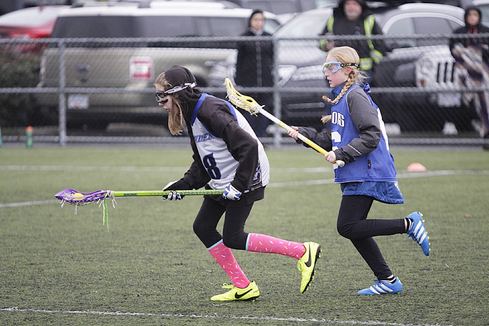 10275992_web1_180121-LAT-U12-lacrosse