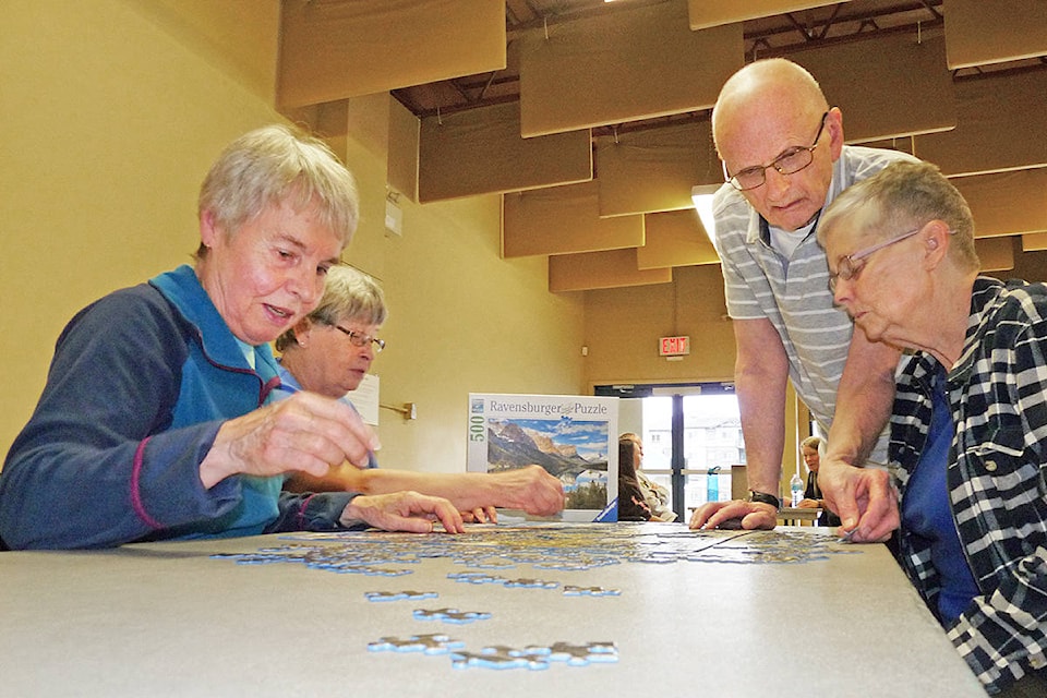 10370622_web1_180127-LAT-puzzle-competition-port-moody-players