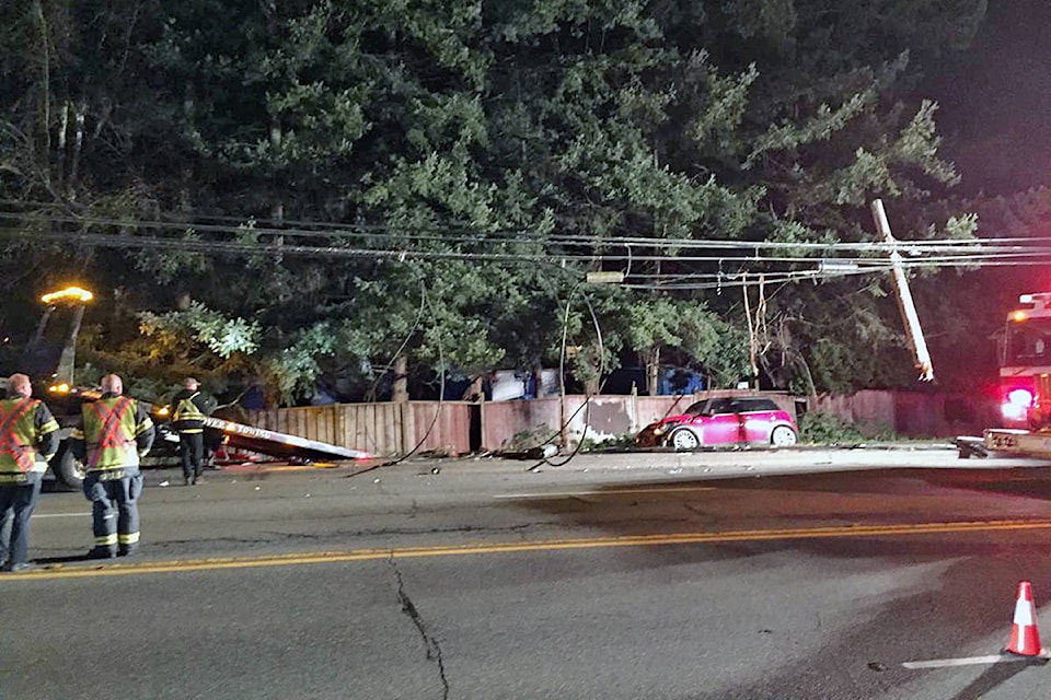 10965379_web1_copy_180312-LAT-car-hits-pole