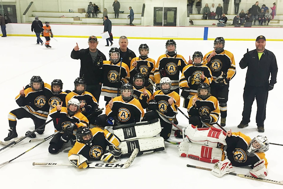 10977843_web1_180315-ALT-wolfpack-takes-gold_1