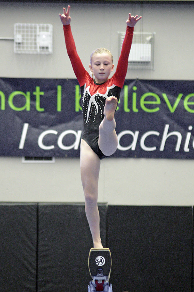 11554630_web1_180421-LAT-Christy-Fraser-balance-beam