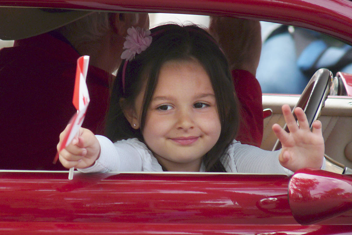 11978399_web1_181021-LAT-May-Day-girl-in-car