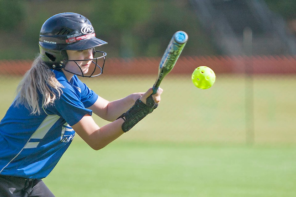 12253219_web1_180609-LAT-SPORTS-U12-softball-championship