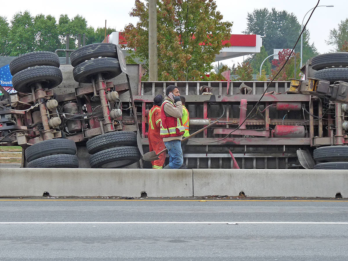 13467147_web1_180908-LAT-truck-flips-3