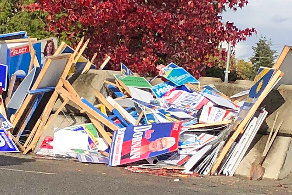 14209673_web1_181031-LAD-discarded-Langley-campaign-signs