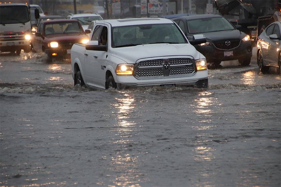 14762522_web1_181211-SNW-M-Surrey-Flood-2