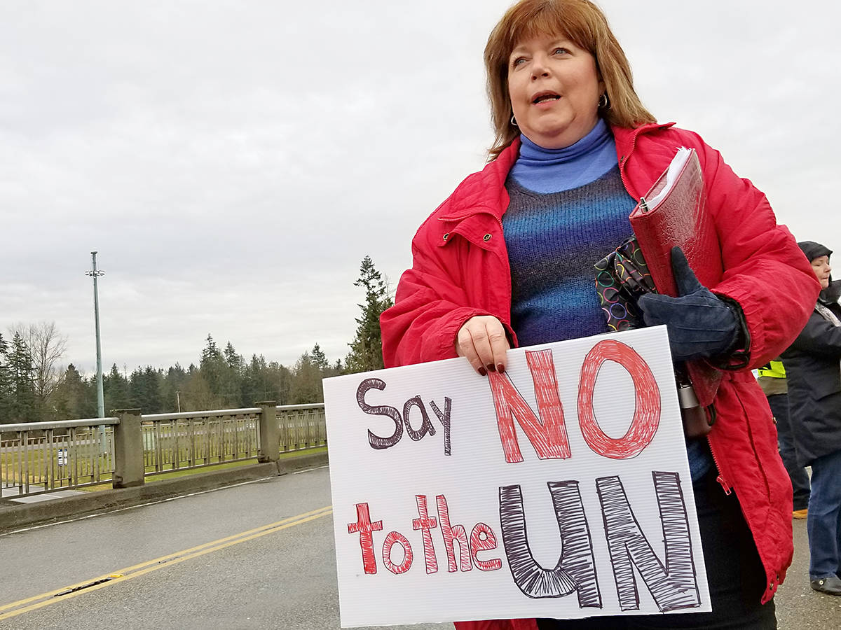 14713578_web1_181208-LAT-232-protest-Kari-Simpson