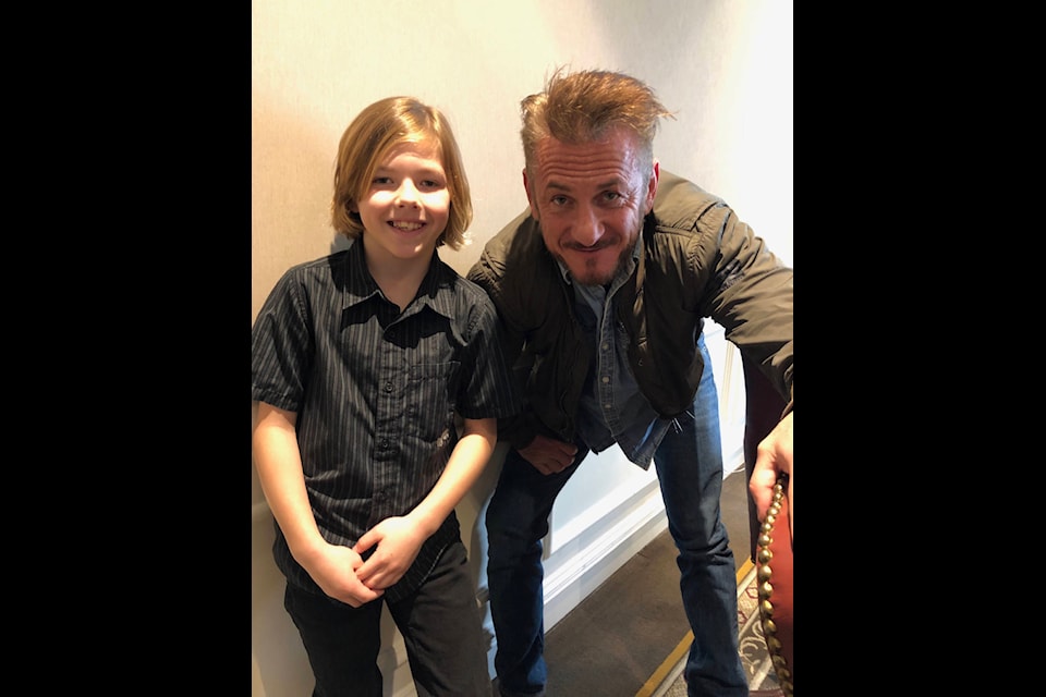 Beckam Crawford Skrypnyk hangs out with Sean Penn during filming in Winnipeg for the new movie “Flag Day.” (Photo: Submitted)