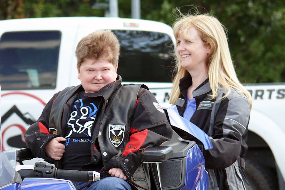 21770449_web1_copy_200607-LAT-ride-for-doug-2020_1
