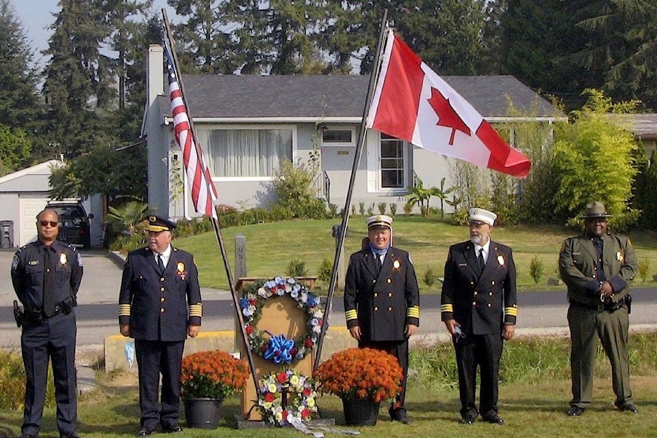 U.S. and Canadian officials gathered at Peace Arch Park Friday morning (Sept. 11) to pay tribute to those who lost their lives in the 2001 terrorist attacks. (John Kageorge photo)