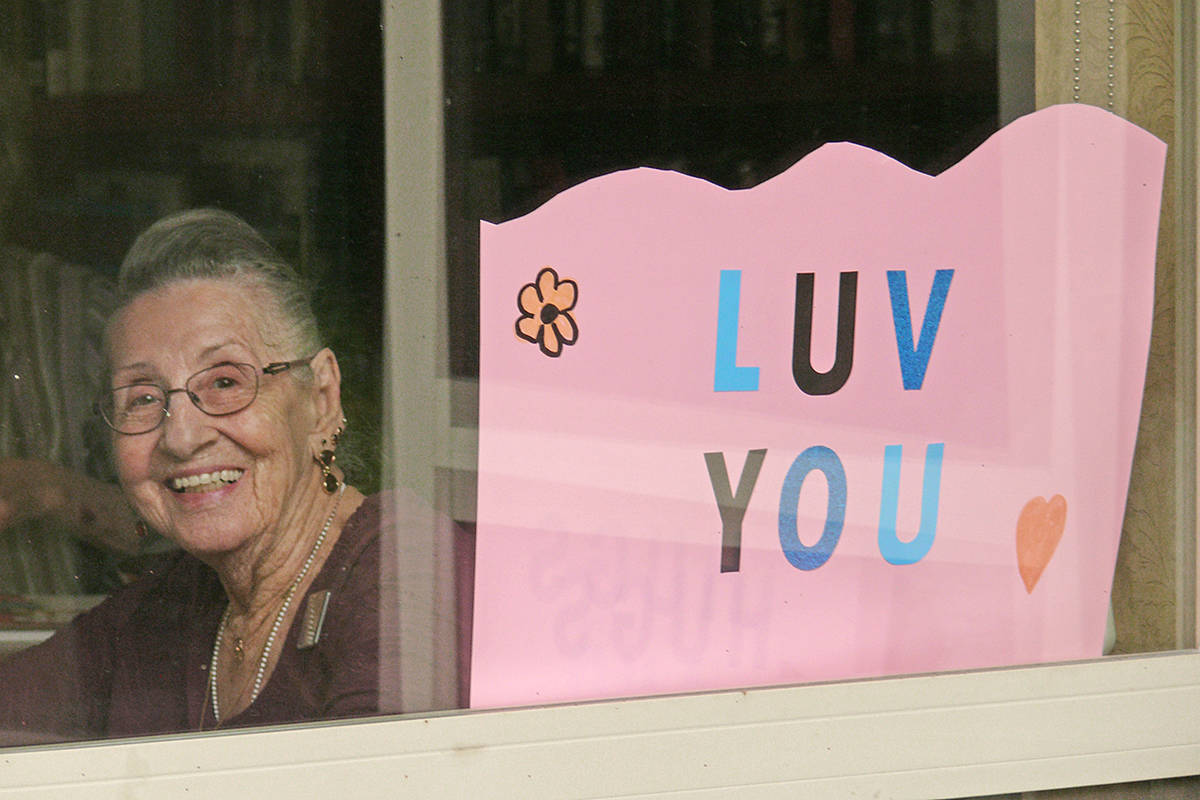 22685868_web1_200912-LAT-drive-by-grandparents-day-sign_1