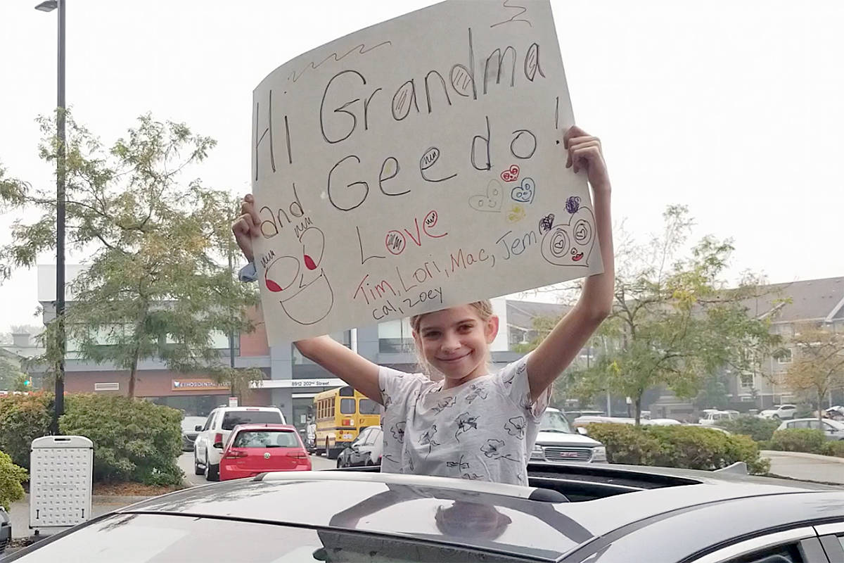 22685868_web1_200912-LAT-drive-by-grandparents-day-sign_2