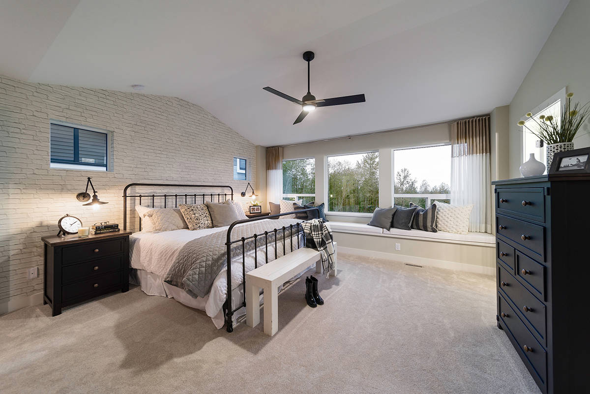 Master bedroom retreats include a sitting room, walk-in closet and spa-like ensuite.