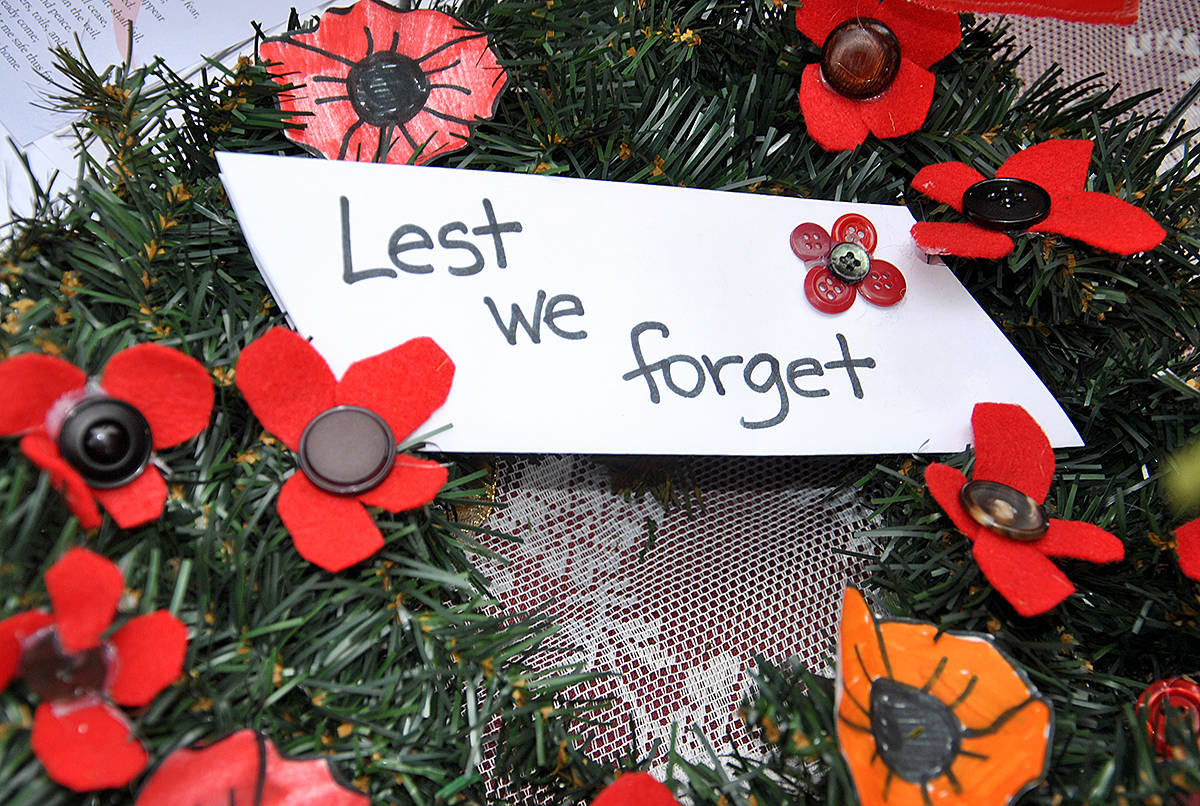 23303101_web1_201111-LAT-MurrayvilleRemembrance-InvitationService_2