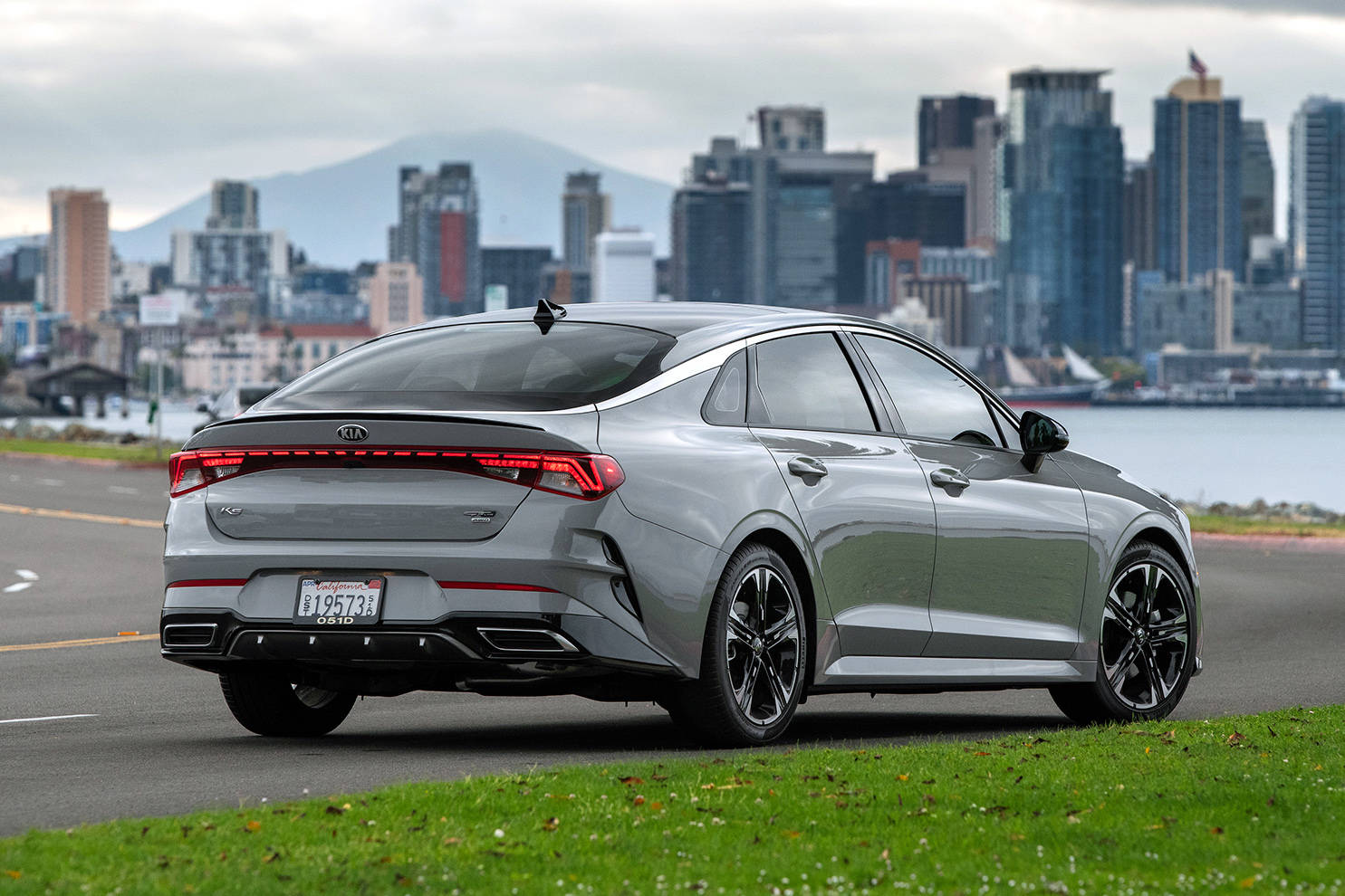 The K5Â’s styling is highlighted by a band of trim that extends above the front door glass, wrapping around the base of the rear window. The full-width taillights are also quite striking. PHOTO: KIA